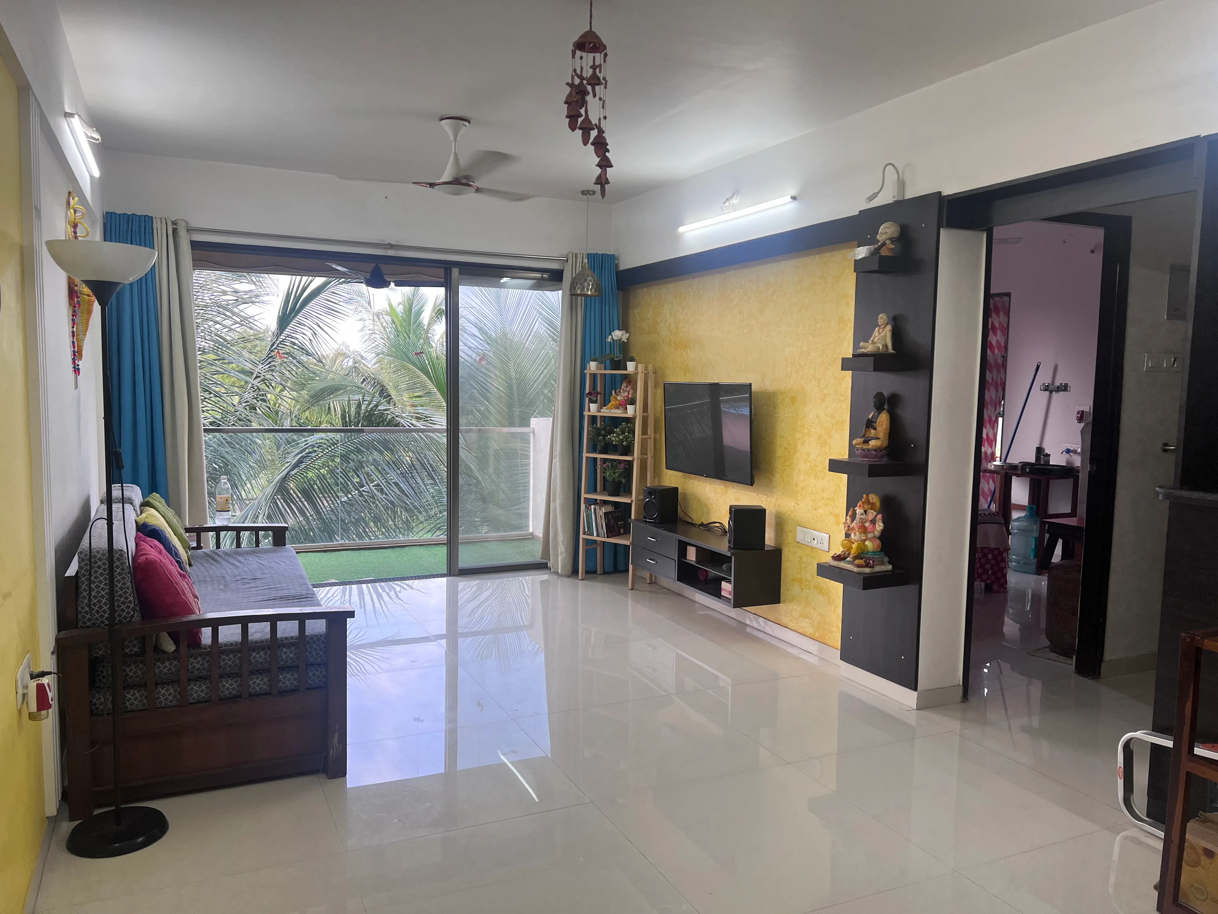 Living Room Balcony Bedroom Entrance — furnished 1BHK flat in Kihim, Alibaug